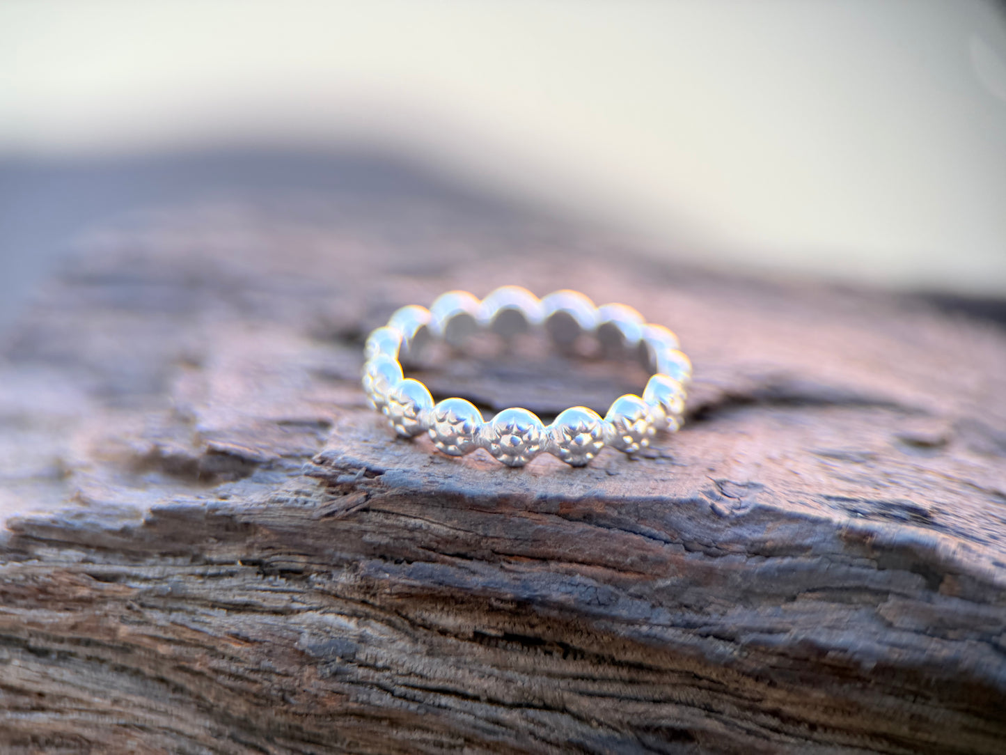 Daisey stacker ring small daisies.