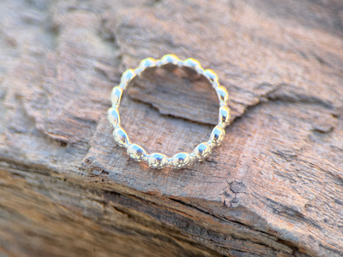 Daisey stacker ring small daisies.